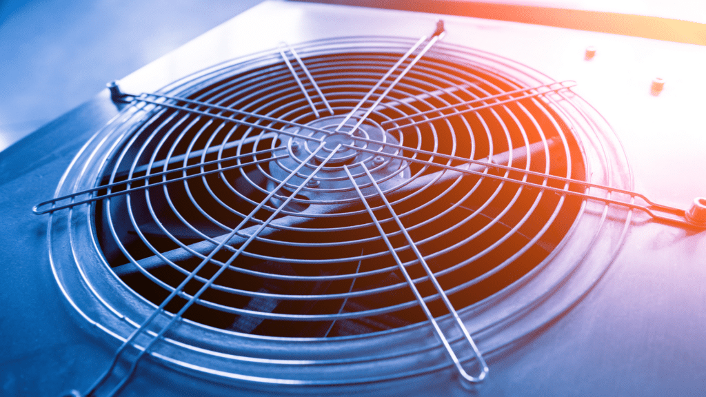 Expert technician performing diagnostic testing on high-efficiency AC system in Yukon, OK residential home