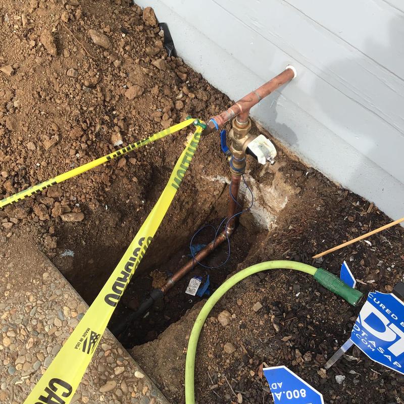 Plumber repairing main water line in Norman, OK office building during business hours