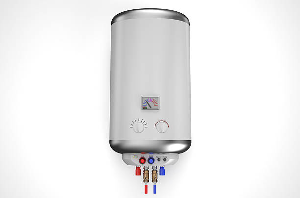 Plumber performing tankless water heater installation adjustments inside an Oklahoma City, OK utility closet